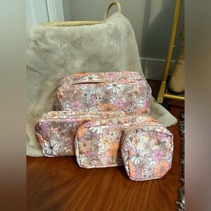 Brand New 4 piece travel set - Pink Lily